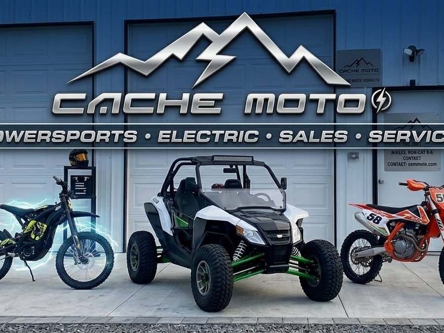 The shop at dusk — gas and electric, side by side